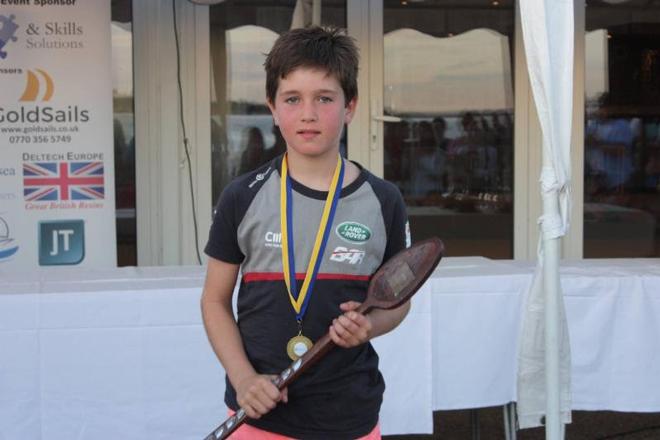 Toby Pearson with the Pyefleet Stir Trophy for the most improved helm – Learning and Skills Solutions Pyefleet Week ©  Mandy Bines